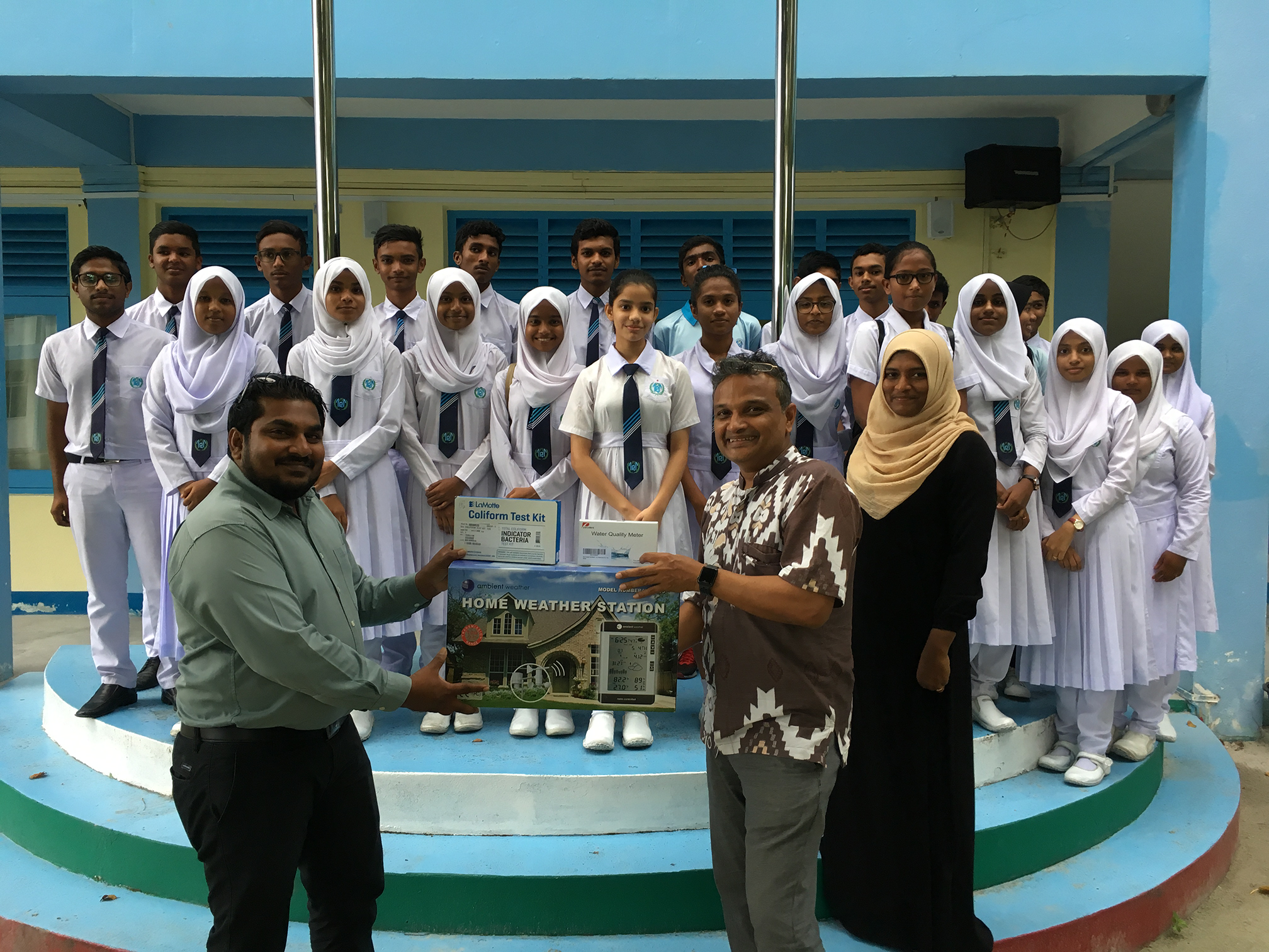 Lareef Zubair hands over the Weather Station, Coliform Kit and 4 in 1 Water Quality Meters to Shifaz Mohamed - Principal at the G. Dh. Atoll Education Center, G. Dh. Thinadhdhoo Maldives.